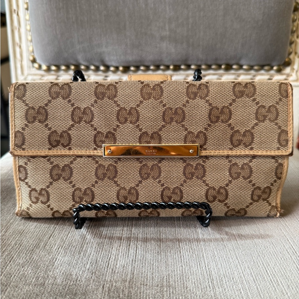 Gucci monogram wallet with double snap detail and dust bag